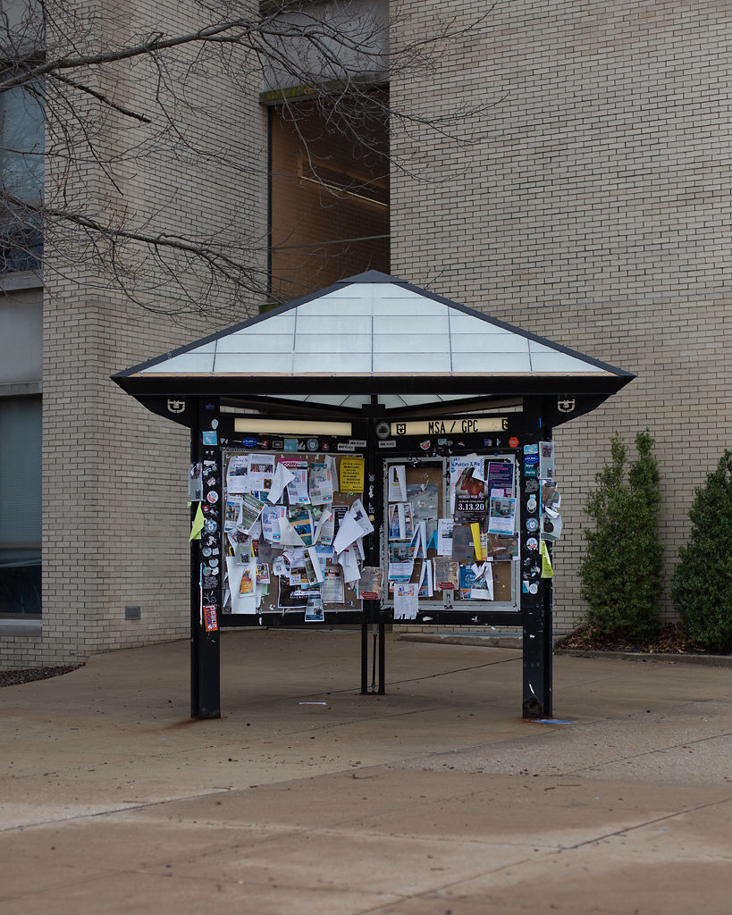 Flyers wave in the warm end-of-winter breeze for events that are now likely cancelled